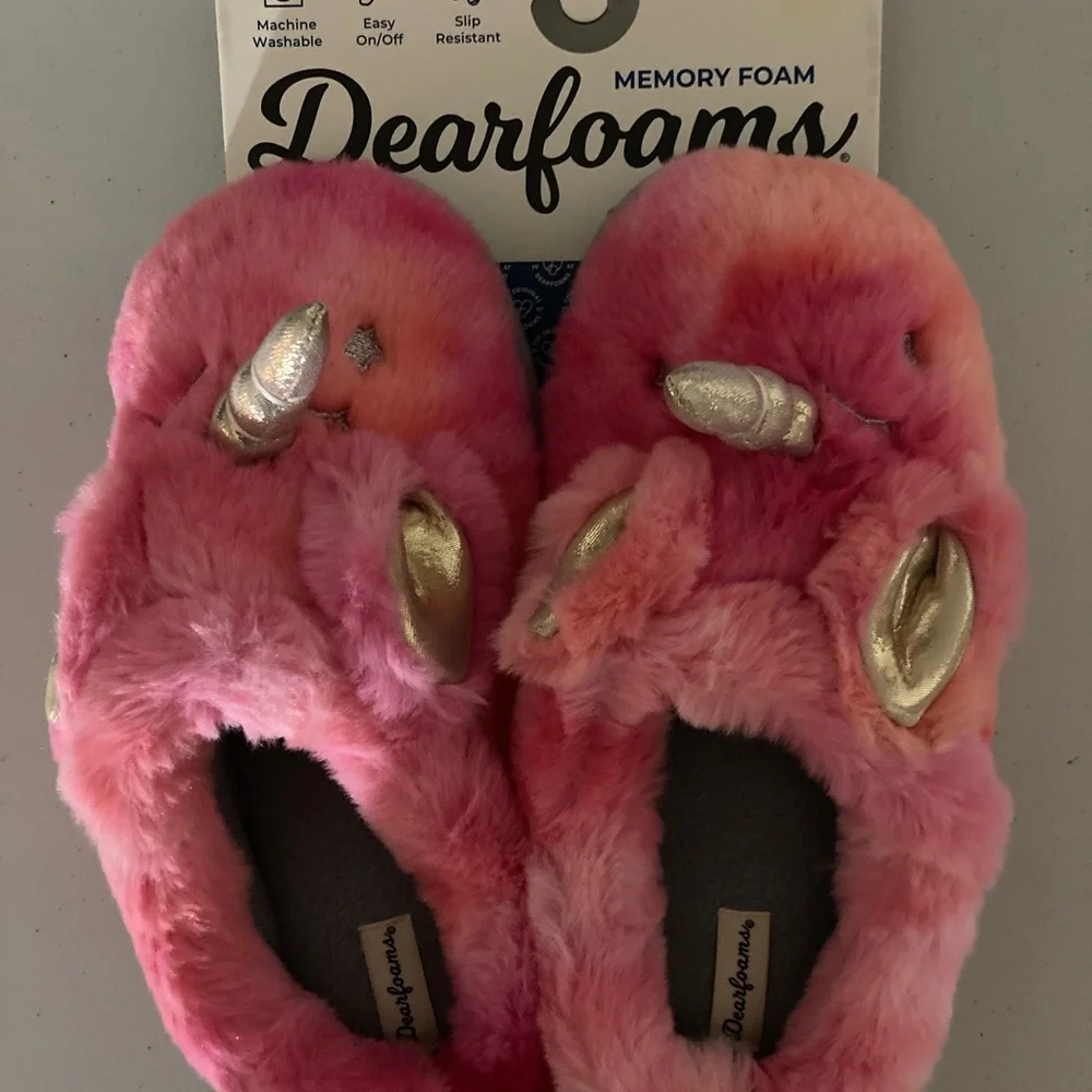 Pink fuzzy unicorn slippers by Dearfoams